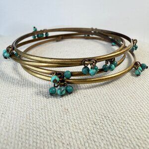 Set Of 4 Antique Gold Tone Bangles‎ With Turquoise Beaded Charms Layering